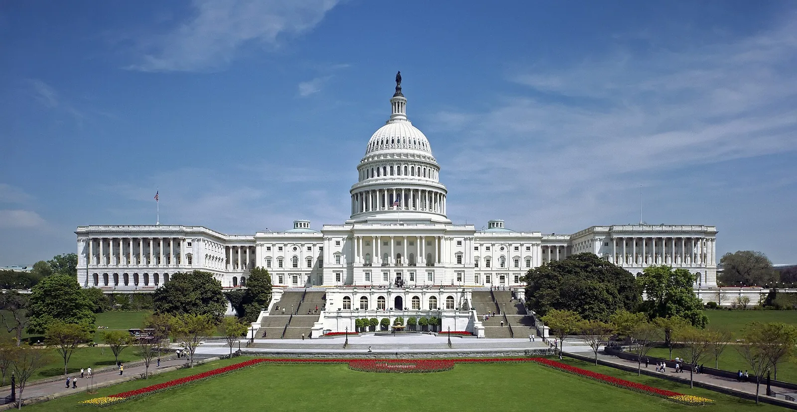 The United States Capitol building, west front, on a clear day.