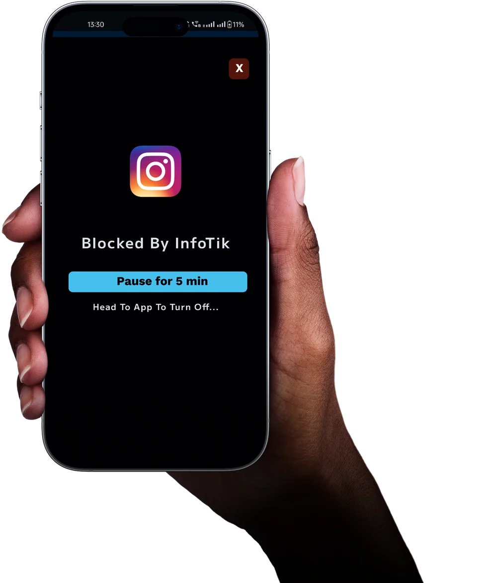 A hand holding a phone showing the 'Blocked by InfoTik' screen with a 'Pause for 5 min' button